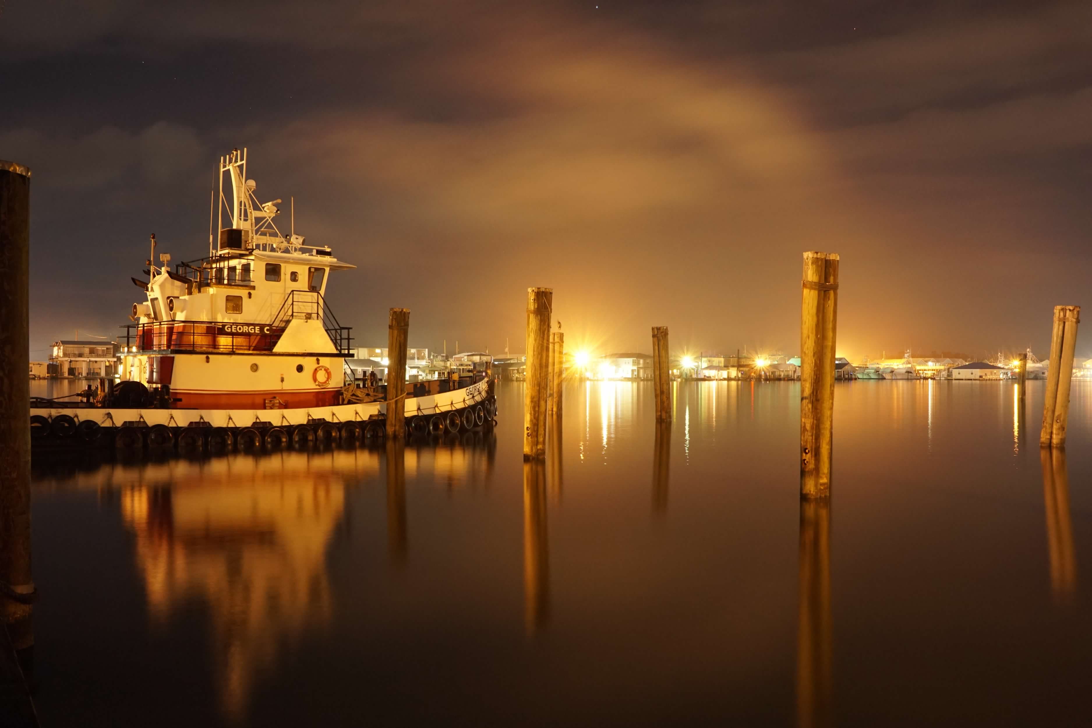 George C at night dock — home hero